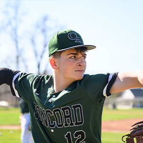 Photo of a baseball player throwing a ball. Read about Gifts of Appreciated Securities